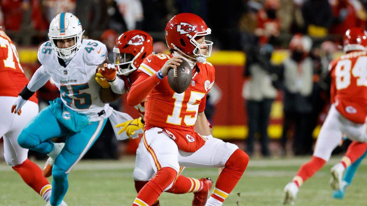 Kansas City Chiefs quarterback Patrick Mahomes (15) looks to pass during first half of an NFL wild-card playoff football game against the Miami Dolphins at GEHA Field at Arrowhead Stadium in Kansas City, Missouri, on Saturday, January 13, 2024.