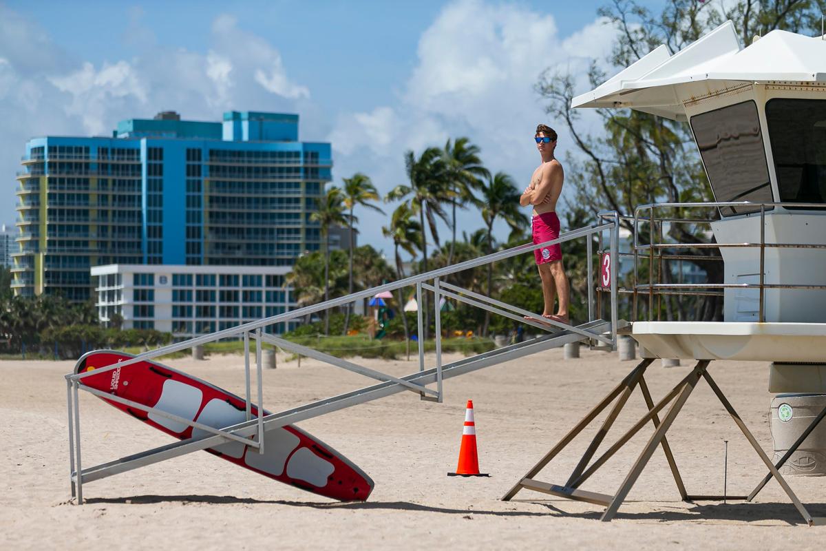 A lifeguard keeps watch at Las Olas Beach in Fort Lauderdale, Florida on Saturday, May 30, 2020.