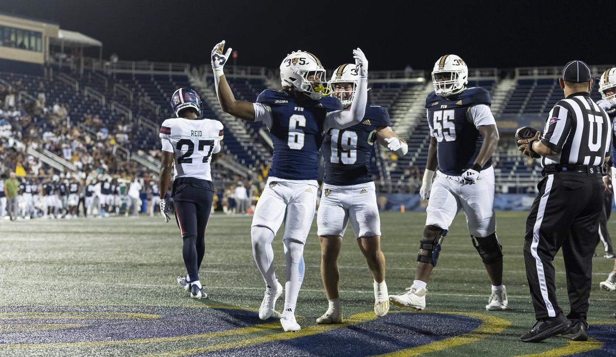 FIU Panthers running back Anthony Carrie (6) celebrates with his teammates after scoring a touchdown against Florida Atlantic University Owls in the second half of their Shula Bowl football game at Pitbull Stadium on Saturday, Sept. 13, 2025, in Miami, Fla.
