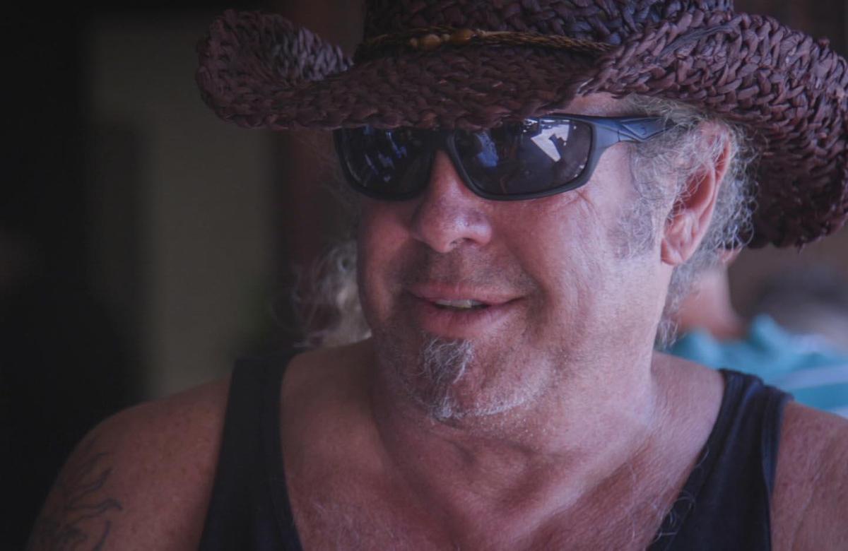 “Tiki” Steve Kottrell of Vero Beach drinks at Waldo’s Bar and Restaurant at the historic Driftwood Inn, reflecting a calmer mood with a shift in track for Dorian that may spare the area a direct hit.