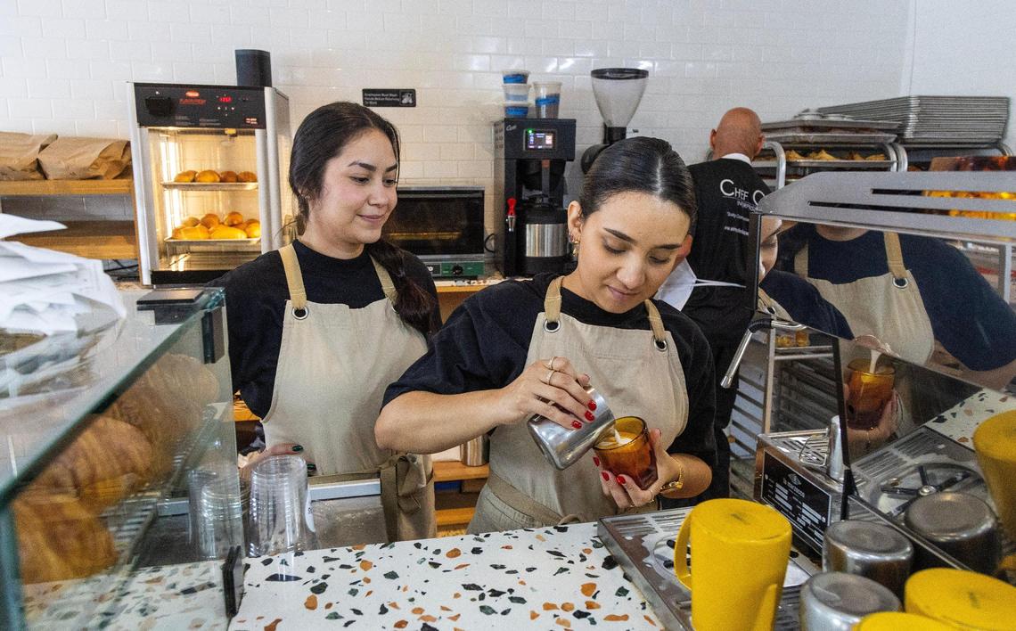 Baristas Gabriela and Andrea prepare coffee at Caracas Bakery in Miami.