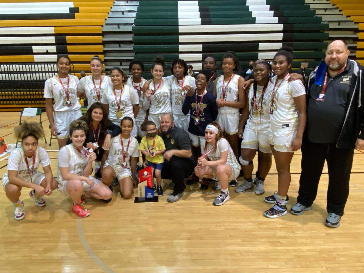 Miami High’s girls’ basketball team celebrates after defeating Miami Norland 49-20 to win the 2021-22 GMAC championship on Thursday night at Miami Jackson High.