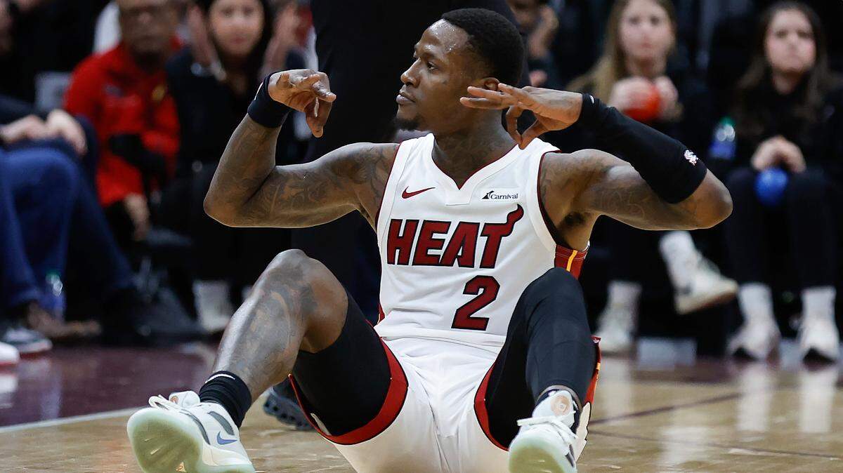 Miami Heat guard Terry Rozier celebrates after making a three point basket and getting fouled against the Cleveland Cavaliers during the second half of an NBA basketball game, Wednesday, March 20, 2024, in Cleveland.