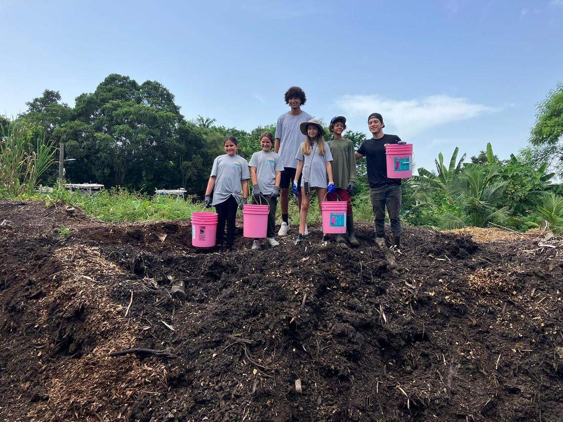 Educational compost program with students with Compost for Life.
