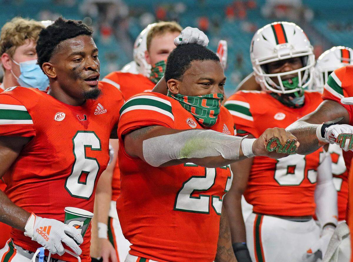 UM’s Cam’Ron Harris (23) shows off the touchdown rings after scoring a first quarter touchdown as the University of Miami hosts the UAB Blazers at Hard Rock Stadium in Miami Gardens on Thursday, September 10, 2020.