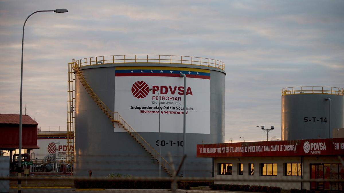 Storage tanks stand in a PDVSA state-run oil company crude oil complex near El Tigre, a town located within Venezuela's Hugo Chávez's oil belt, formally known as the Orinoco Belt, in February 2015.