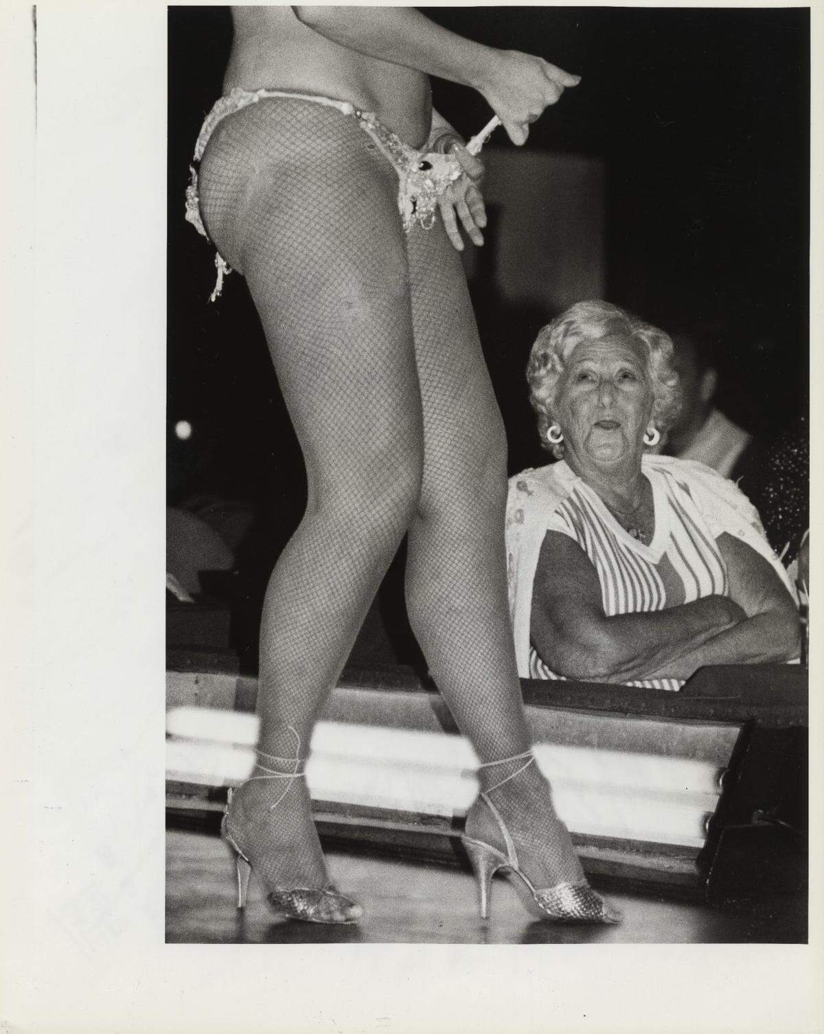 A dancer performs at Place Pigalle.