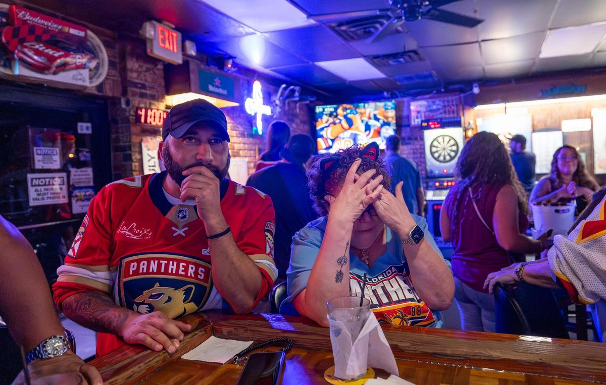 Florida Panthers fan Karen Shelton reacts after the Edmonton Oilers scored against her team in Game 2 of the NHL Stanley Cup Final at the Inn Field Bar & Grill on Friday, June 6, 2025, in Sunrise, Fla.