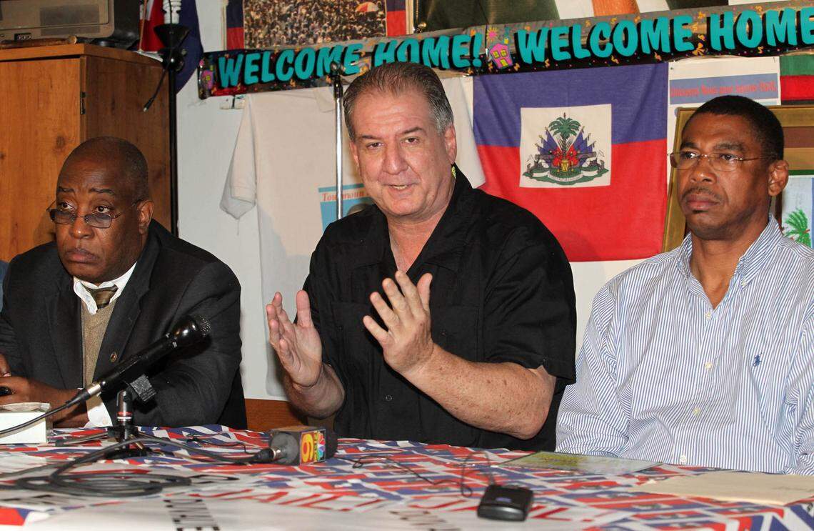 In 2011, Jack Lieberman, center, with the Haiti Solidarity Committee, joins Jean Lafortune, chairman of the Haitian-American Grassroots Coalition, left, and Jean Marcellus, vice mayor of North Miami in Little Haiti during a press conference discussing the arrival in Haiti of former president Jean-Claude “Baby Doc” Duvalier.