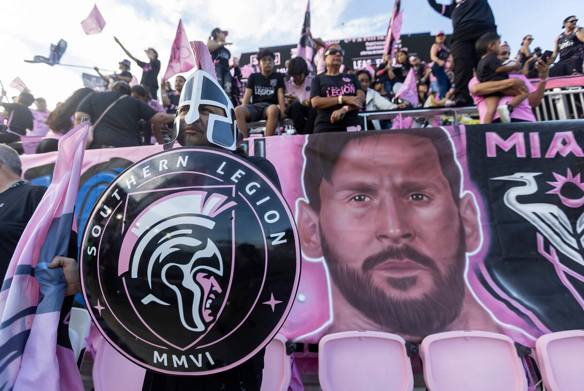 Inter Miami fan Tata Cambar looks on as people cheer before the start of a Leagues Cup group stage match between Inter Miami and Cruz Azul at DRV PNK Stadium on Friday, July 21, 2023, in Fort Lauderdale, Fla.
