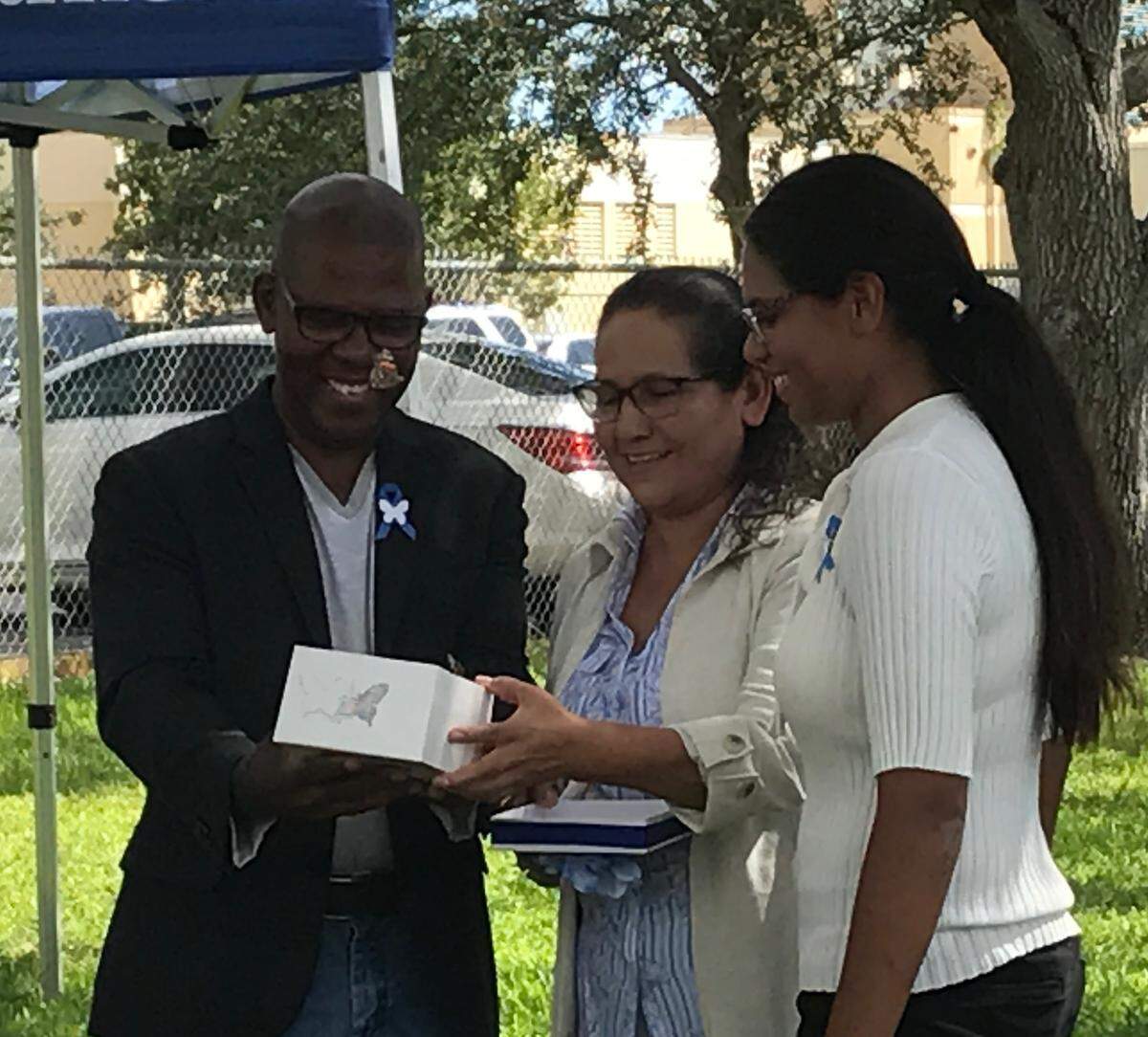 Jorge, Maria and Brenda Gough release a box full of butterflies at Southwood Middle School during a Thursday, Sept. 20, 2018, ceremony honoring Jaime Gough, who was killed in 2004 at the age of 14.