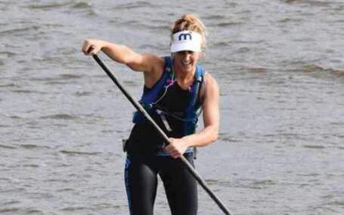 Seychelle Hattingh rows her standup paddleboard at Nathan Benderson Park in Sarasota while breaking the record for the most miles covered on a standup paddleboard in a 24-hour period.
