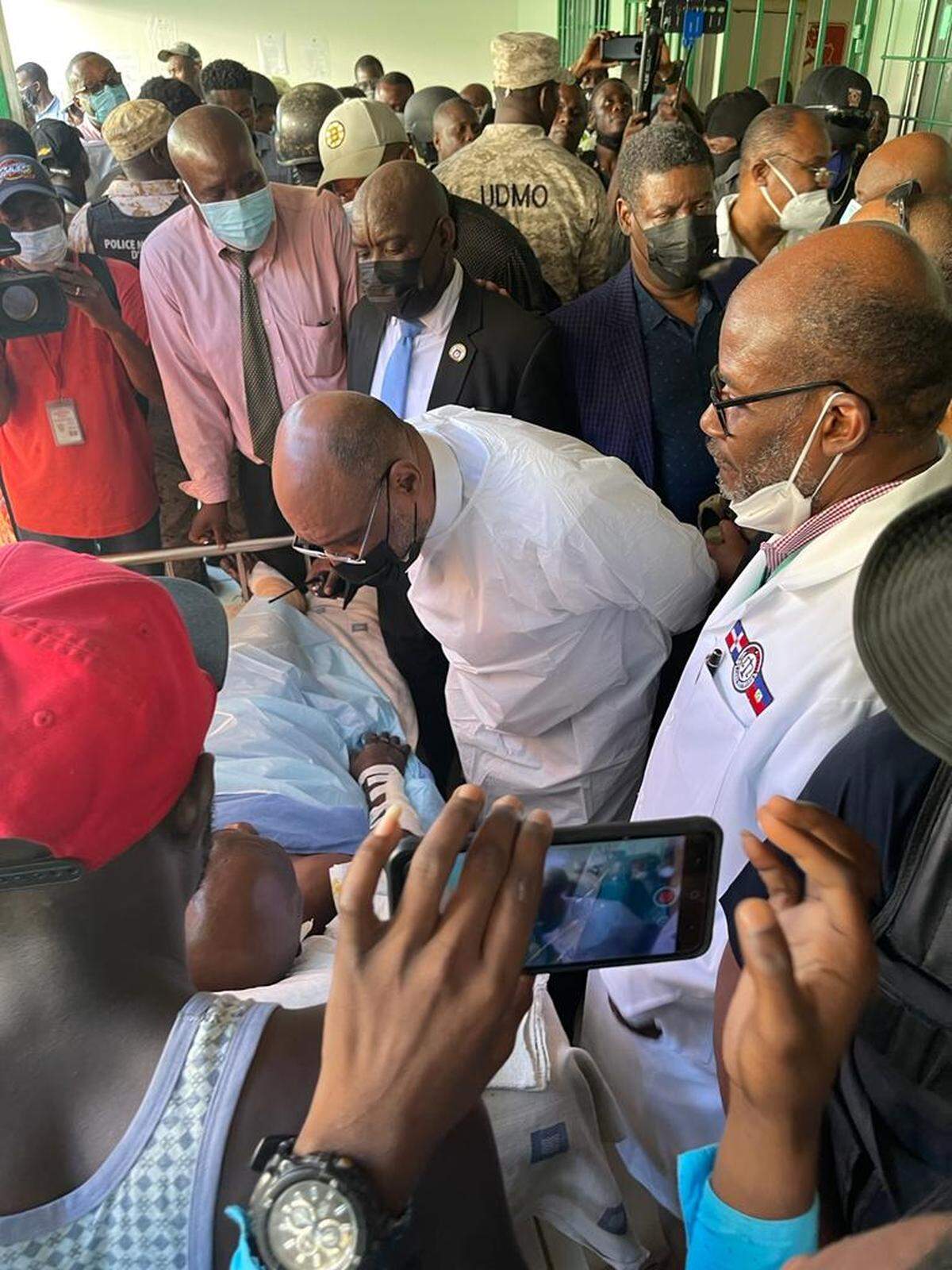 Haitian Prime Minister Ariel Henry visits victims of fuel tanker explosion at Justinien University Hospital on Tuesday, December 14, 2021. The explosion has claimed at least 66 lives and injured dozens.
