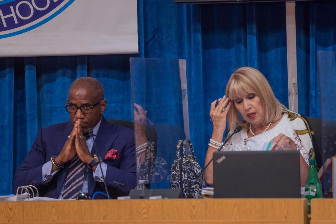Miami-Dade School Board Vice Chair Dr. Steve Gallon III, left, and Board Member Mari Tere Rojas at the Miami-Dade School Board meeting on July 20, 2022, in Miami. Gallon voted to adopt the sexual-education textbook; Rojas voted not to adopt the book.