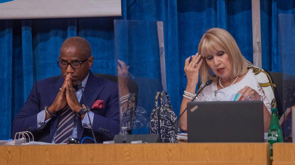 Dr. Steve Gallon III, vice chair of Miami-Dade County School Board,left, and Board member Mari Tere Rojas at Wednesday’s meeting.
