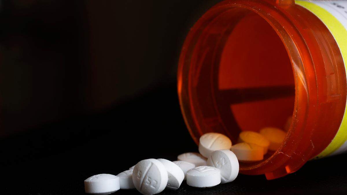 FILE - This Aug. 29, 2018, file photo shows an arrangement of Oxycodone pills.