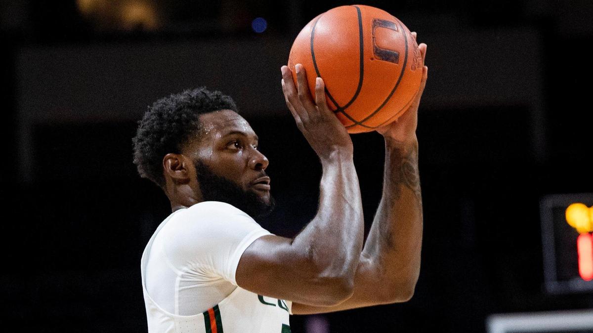 Miami Hurricanes guard Wooga Poplar (5) shoots a basket during the first half of the Miami Hurricanes home opener against NJIT on Monday, Nov. 6, 2023, at the Watsco Center in Coral Gables.