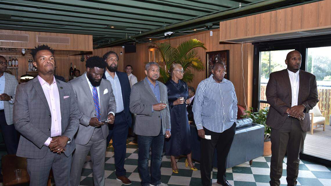 Black businesspeople convene at Overtown’s Red Rooster restaurant to discuss business strategies.