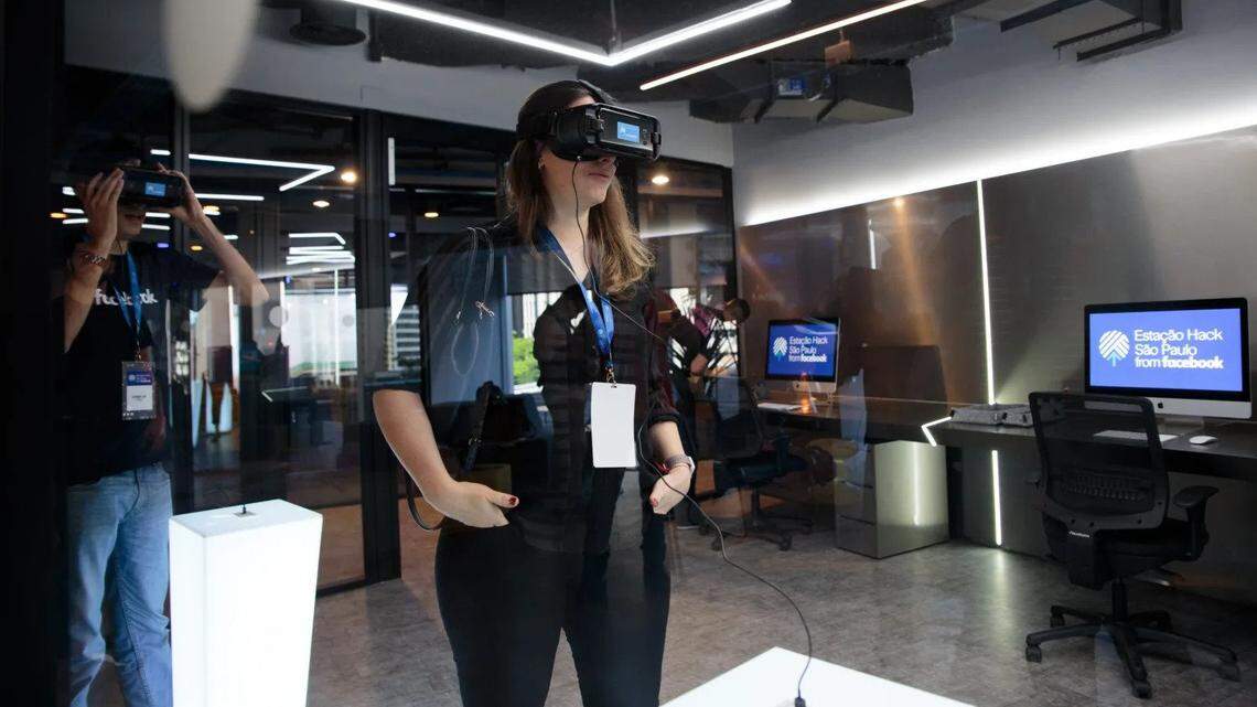 Students wear virtual-reality headsets at the Facebook Inc. Hack Station in Sao Paulo, Brazil, a center that offers coding classes, entrepreneurship workshops and career guidance.