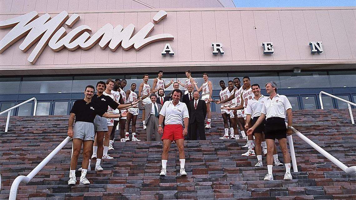 In 1988, Heat players and assistants, framing Coach Ron Rothstein and team officials at the entrance of Miami Arena.