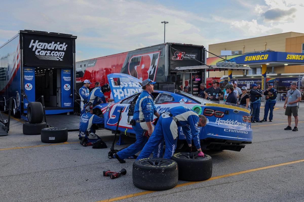Kyle Larson’s (5) mechanics and crew work on his vehicle after his car hit the sand barrels during the NASCAR 4EVER 400 Cup Series on Sunday, Oct. 22, 2023, at Homestead-Miami Speedway in Homestead, Fla.