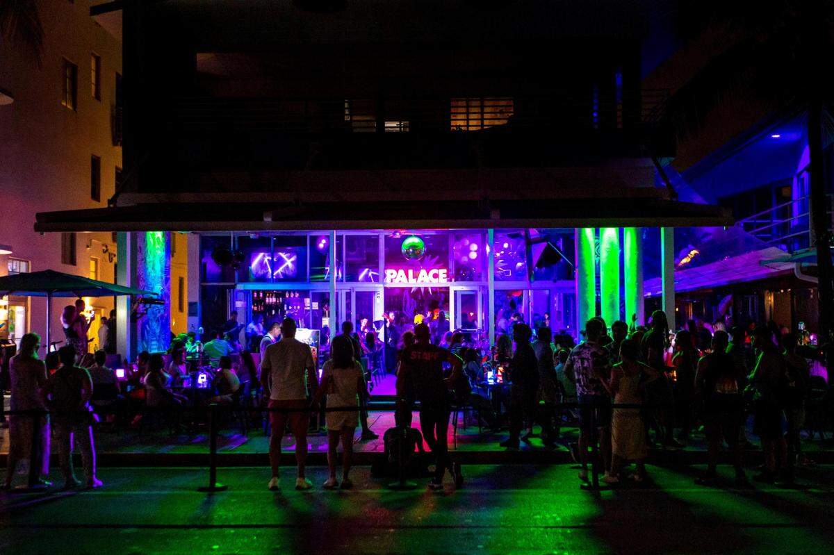Paace bar and Restaurant just before the City of Miami Beach imposed curfew at midnight to curb violence during Spring Break on Open Drive in Miami Beach, Florida, on Thursday, March 24, 2022.