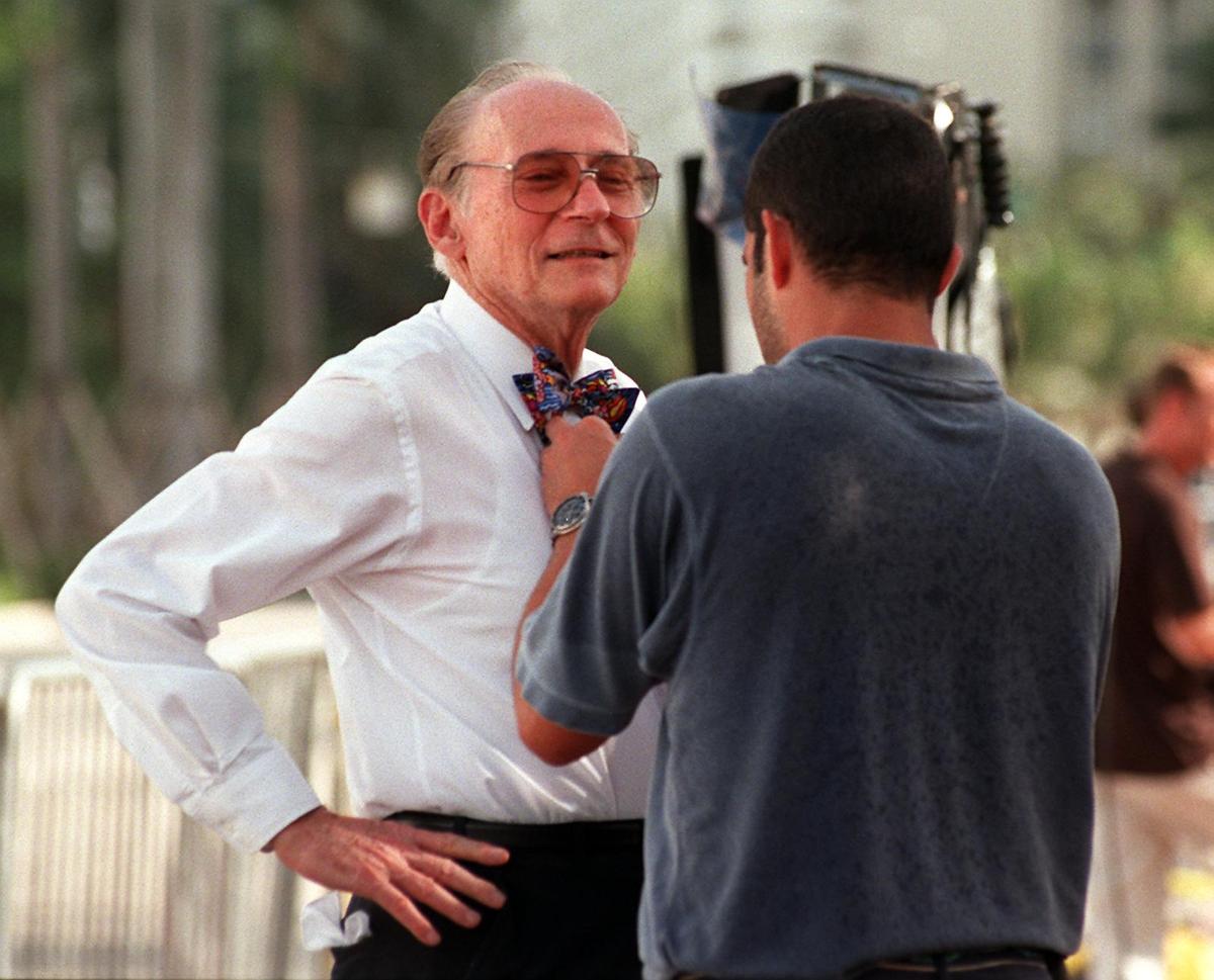 In 1997, Miami Beach Mayor Seymour Gelber gets his bow tie straightened before an interview about the murder of Gianni Versace and the death of his killer.