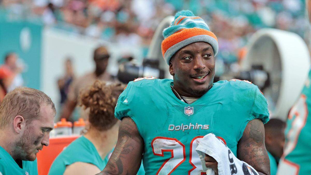 Miami Dolphins running back Duke Johnson (28) on the sidelines after scoring touchdowns against the New York Jets at Hard Rock Stadium in Miami Gardens on Sunday, December 19, 2021.