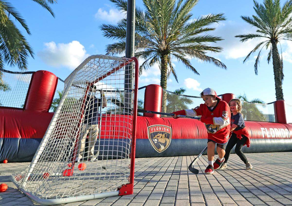Kids playing as part of the fan experience activities prior the Florida Panthers NHL home opener game against the Pittsburgh Penguins at the FLA Live Arena on Thursday, October 14, 2021 in Sunrise, Fl.