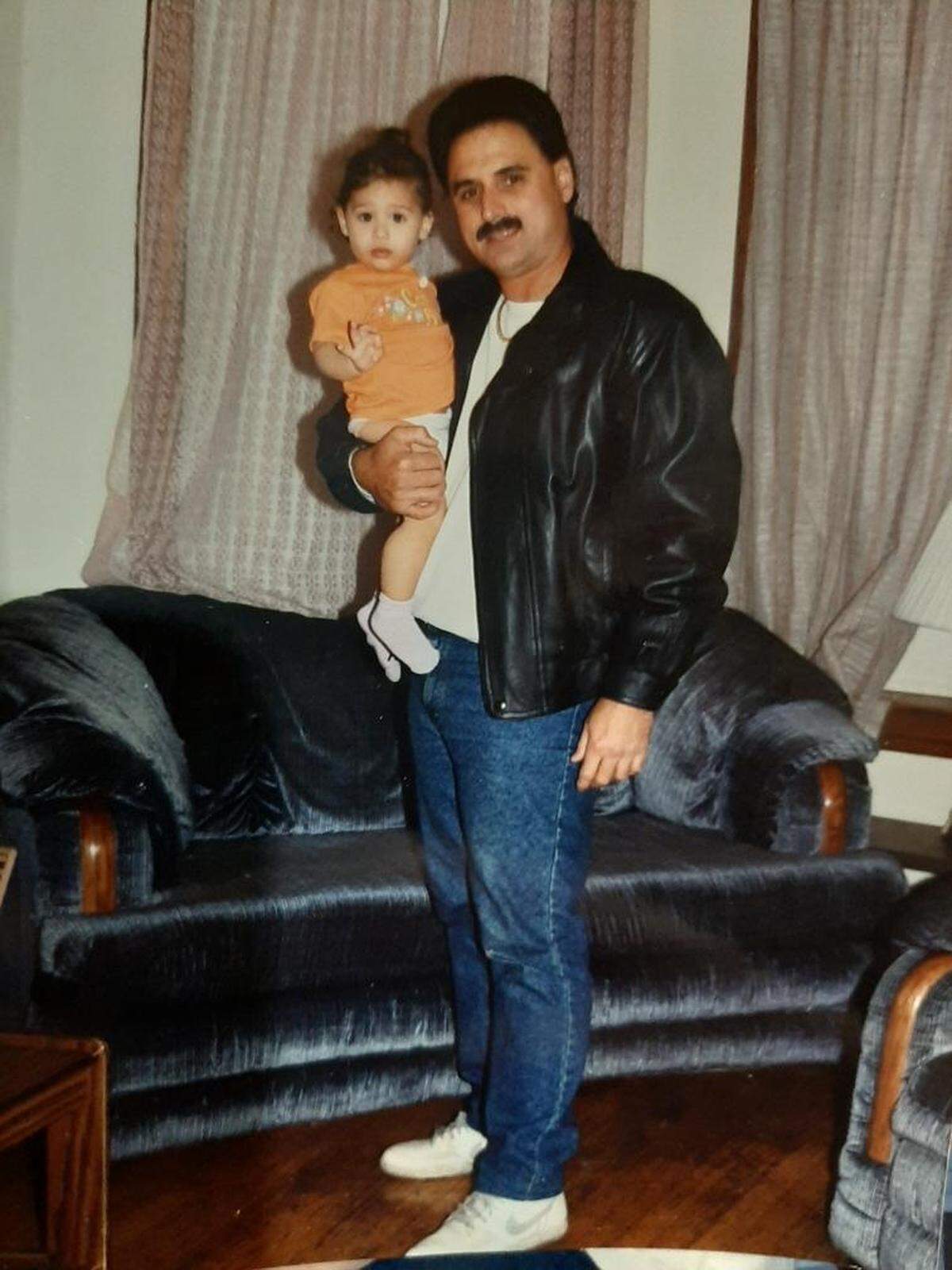 Heriberto Delvalle with his toddler, Barbara, in the early ’90s.