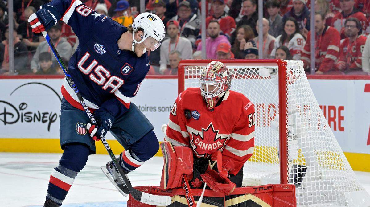 Feb 15, 2025; Montreal, Quebec, CAN; Team Canada goalie Jordan Binnington (50) stops Team United States forward Matthew Tkachuk (19) in the first period during a 4 Nations Face-Off ice hockey game at the Bell Centre.