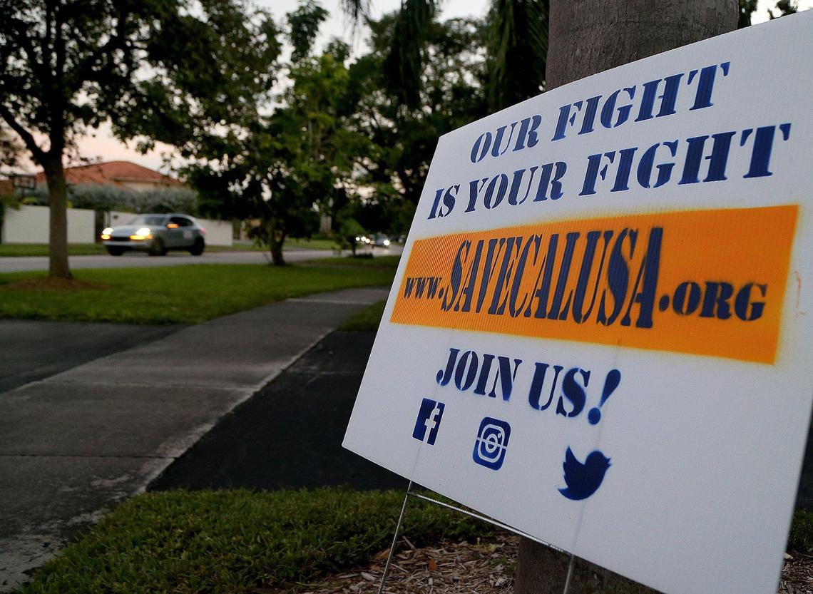 Residents of the Calusa neighborhood in Kendall attended a rally and drive-through demonstration to “Save Calusa,” as part of a campaign to prevent redevelopment of the golf course land into a 450-house subdivision. Residents are upset that their neighborhood will be ruined, on Tuesday, October 13, 2020.