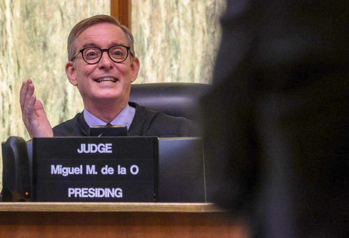 Judge Miguel M. de la O talks with the attorneys of Frank Artiles, the former Florida senator accused of paying a ghost candidate more than $40,000 to influence a Florida Senate seat election with a heavily favored Democratic candidate, during the jury selection of Artiles’ trial on Monday, Sept. 16, 2024, at Courtroom 4-1 at the Richard E. Gerstein Justice Building in Miami, Florida.