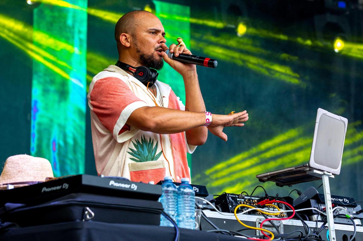 DJ Walshy Fire plays music during AFROPUNK music festival at The Urban in the Historic Overtown neighborhood of Miami, Florida, on Saturday, May 21, 2022.