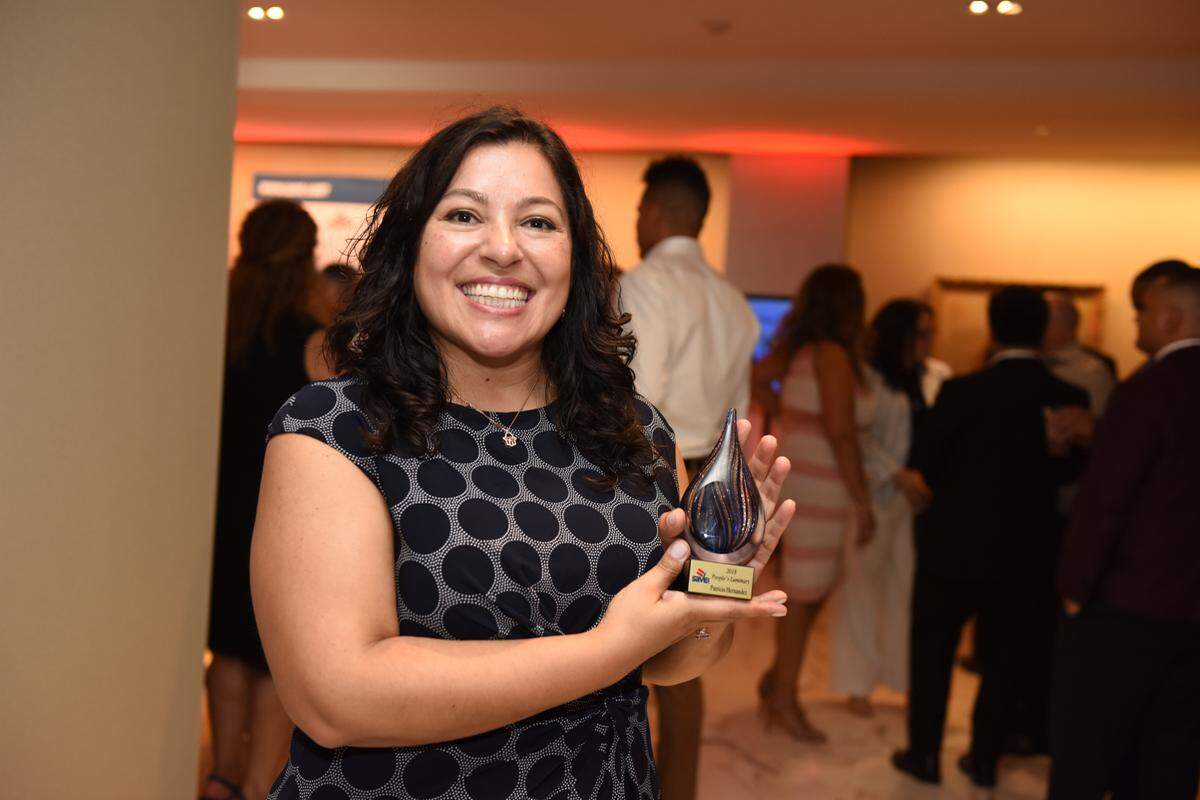 Immigation attorney Patricia Hernandez, winner of the People’s Choice Award, on Thursday, Sept. 13, at the 2018 SAVE Luminary Awards at Bacardi USA headquarters in Coral Gables.