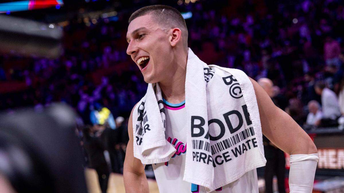 Miami Heat guard Tyler Herro (14) reacts to defeating the Magic 125-119 during double overtime of an NBA game at Kaseya Center on January 27, 2025, in Miami.