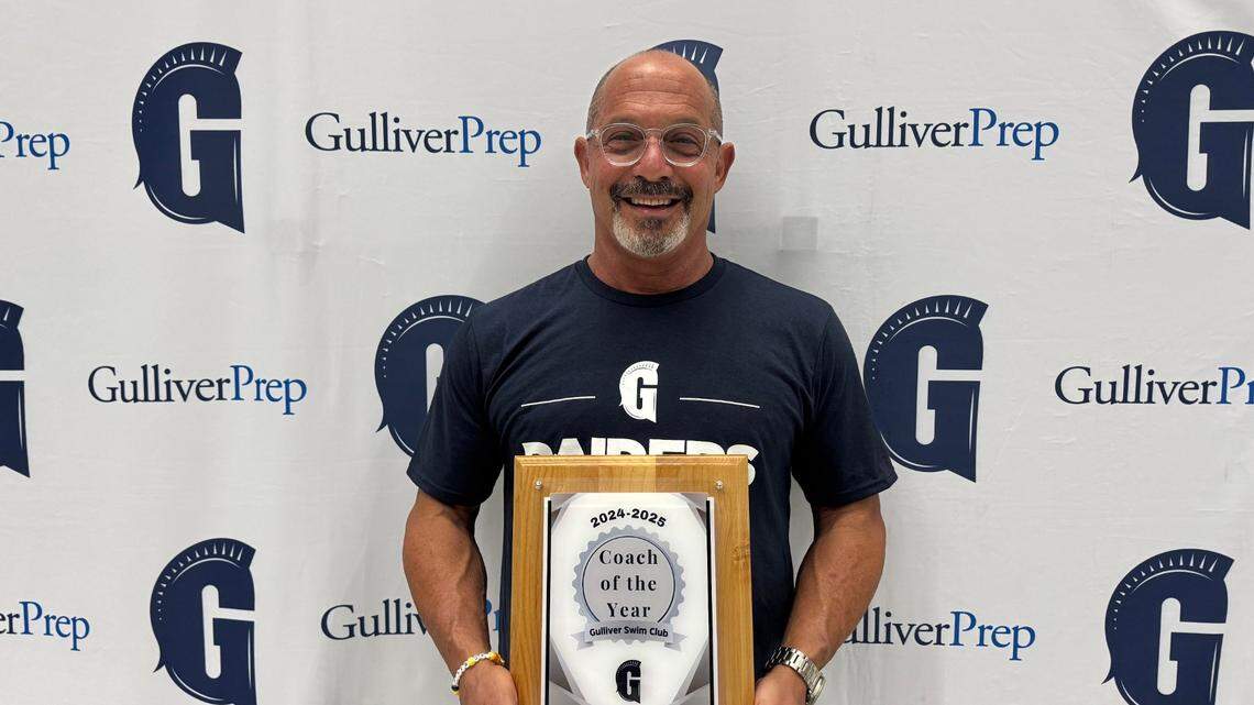 Record-breaking swimmer Mike LaMonica was recently named Swim Coach of the Year at the Gulliver Prep annual banquet.