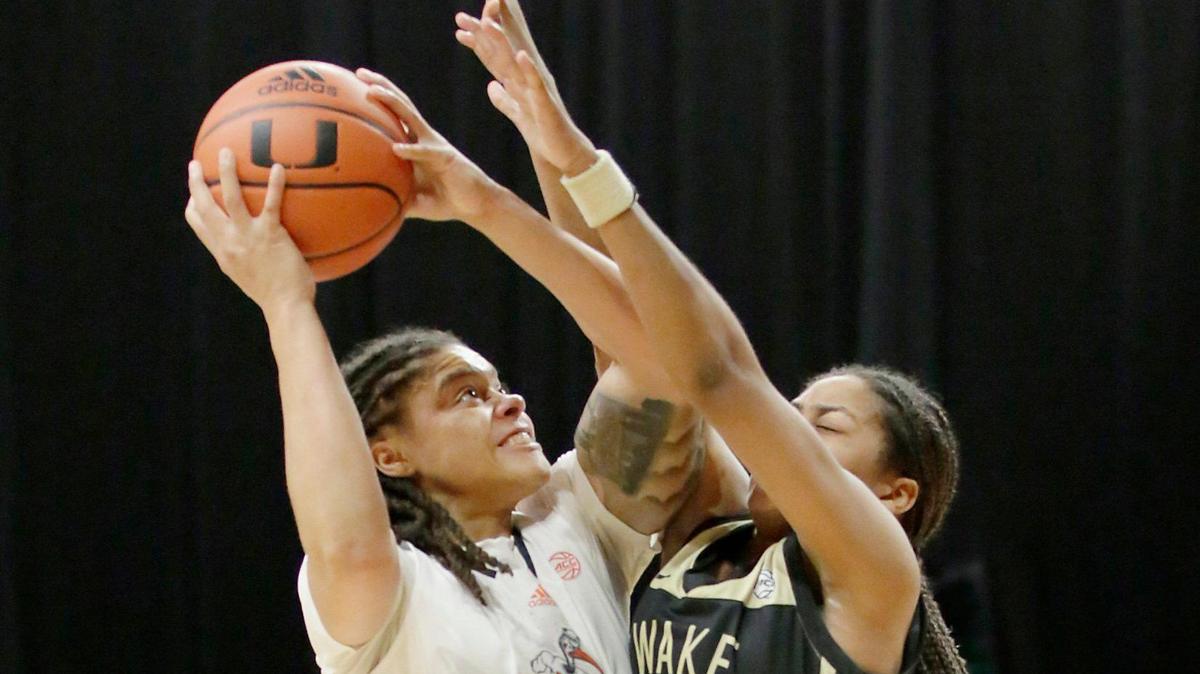 UM Hurricanes Destiny Harden (3) tries to shot against Wake Forest during NCAA women’s basketball game on Sunday, January 15, 2023 at Watsco Center in Coral Gables. Andrew Uloza / for Miami Herald