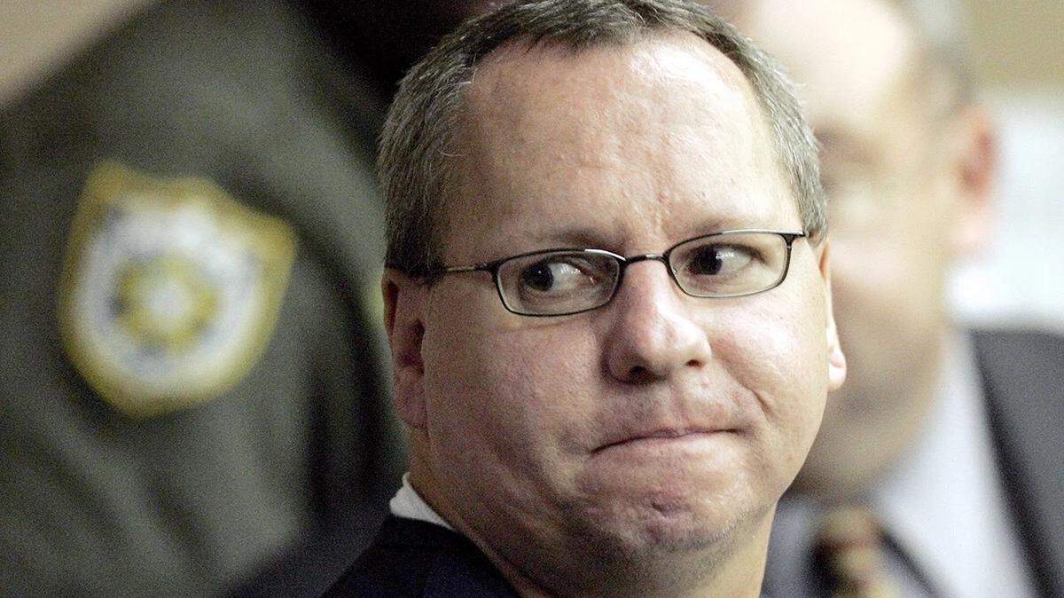August 11, 2006; Palm Beach, FL; Death row inmate Duane Owen looks back at the courtroom observers before being led away August 11, 2006 at the Palm Beach Courthouse. Mandatory Credit: -Richard Graulich/Palm Beach Post-USA TODAY NETWORK