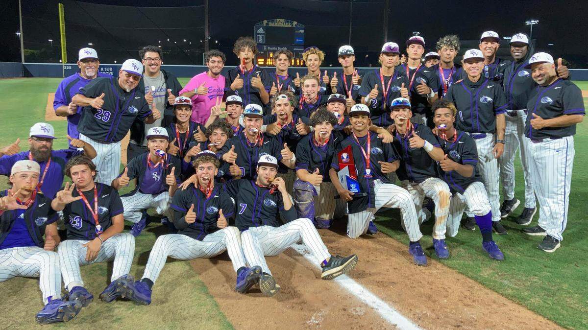 The Southwest Miami High baseball team celebrates after an 8-2 win over Miami Springs which secured its first GMAC baseball championship in over a decade.