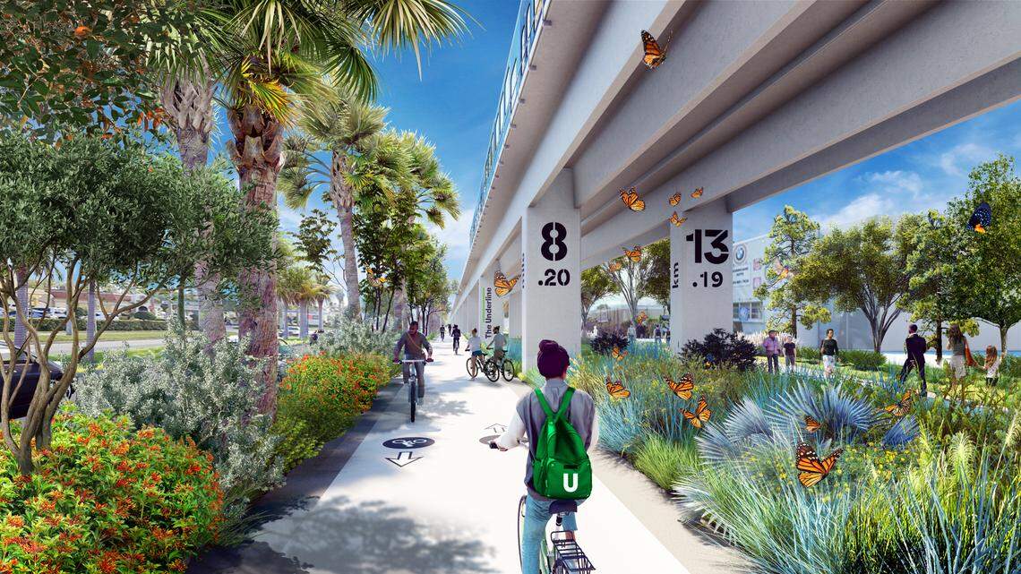 An artistic rendering shows a section of the bike path beneath the Metrorail tracks planned for the third and final phase of The Underline trail and linear park.