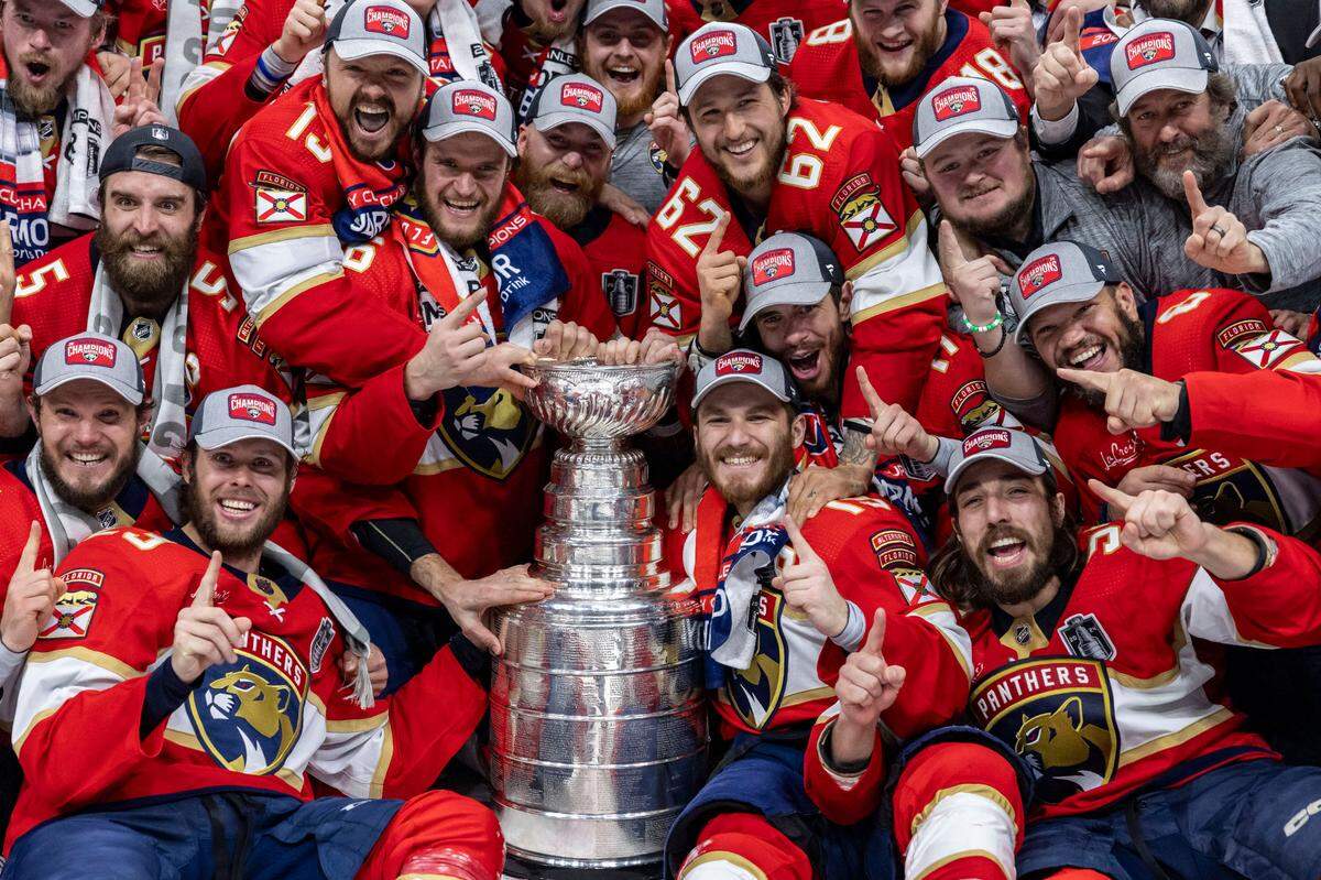 Sunrise, Florida, June 24, 2024 - Panthers celebrate with the Stanley Cup after defeating the Edmonton Oilers in Game 7 of the Stanley Cup Final