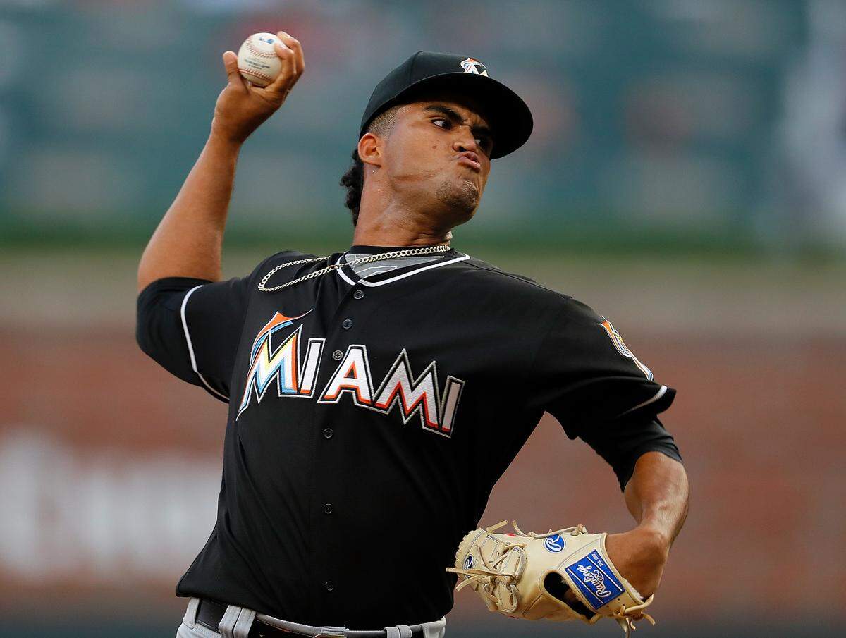 ATLANTA, GA - AUGUST 13:  Merandy Gonzalez #77 of the Miami Marlins pitches in the first inning against the Atlanta Braves during game two of a doubleheader at SunTrust Park on August 13, 2018 in Atlanta, Georgia.  (Photo by Kevin C. Cox/Getty Images)