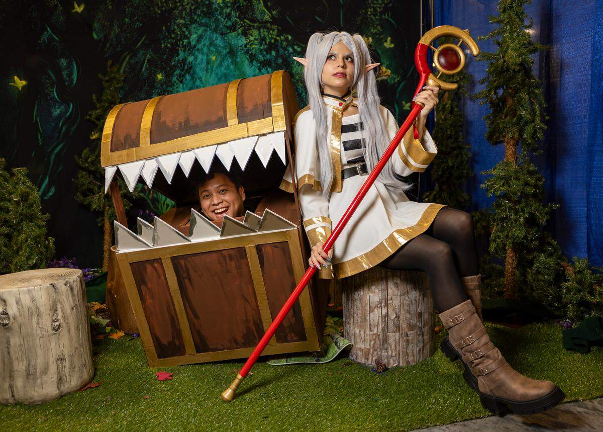 Cosplayers Tere Correa, right, as Frieren and Win H. as a mimic from 'Frieren.'
