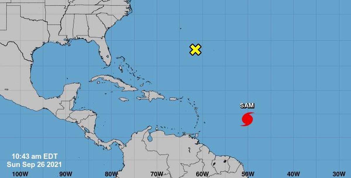 The two weather systems in the Atlantic Ocean as of 10:43 a.m. Sunday