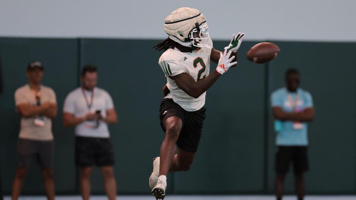 Miami Hurricanes defensive back Damari Brown (2) catches a football during spring practice at the Carol Soffer Indoor Practice Facility at the University of Miami in Coral Gables, Florida, Tuesday, April 1, 2025.