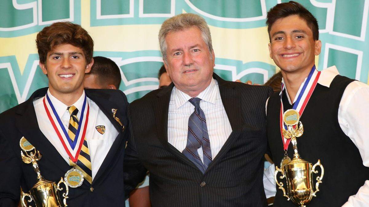 Belen's Aitor Fungairino, left, and Miguel Cancel, right, are winners for swimming and diving.