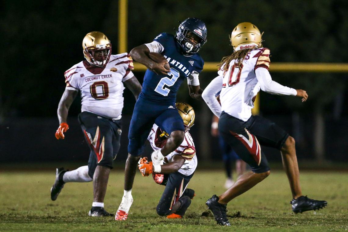 Palmetto Panthers quarterback Jacory Barney (2) runs with the football during the second quarter against the Coconut Creek Cougars at Miami Southridge Senior High School in South Miami, Florida, Thursday, November 3, 2022.