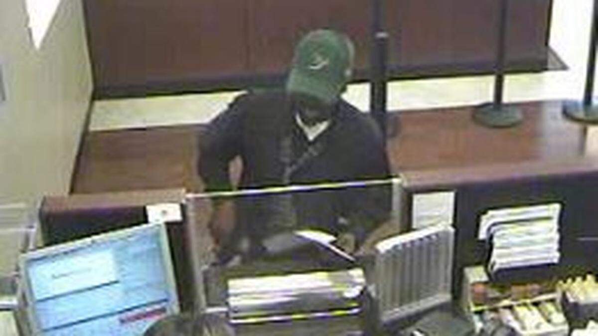 The bank robbery suspect called ‘The Ball Cap Bandit’ at a Chase Bank on April 14, 2016, one of the four robberies for which he’s being charged.