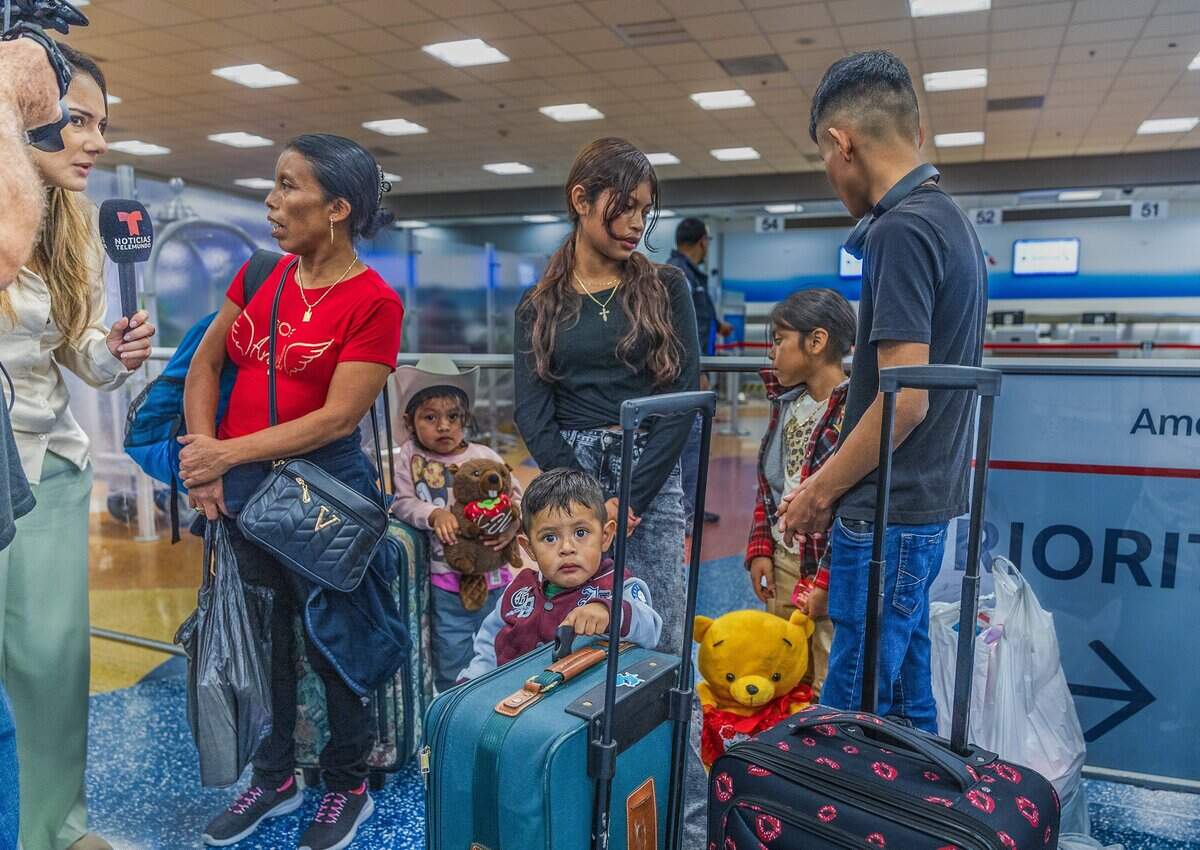After her husband was deported, Magdalena, far left, decided to self-deport to Guatemala with her children, from left, Ingrid, Mercedes, Cristina and Ramón, and her grandson, Angel, center